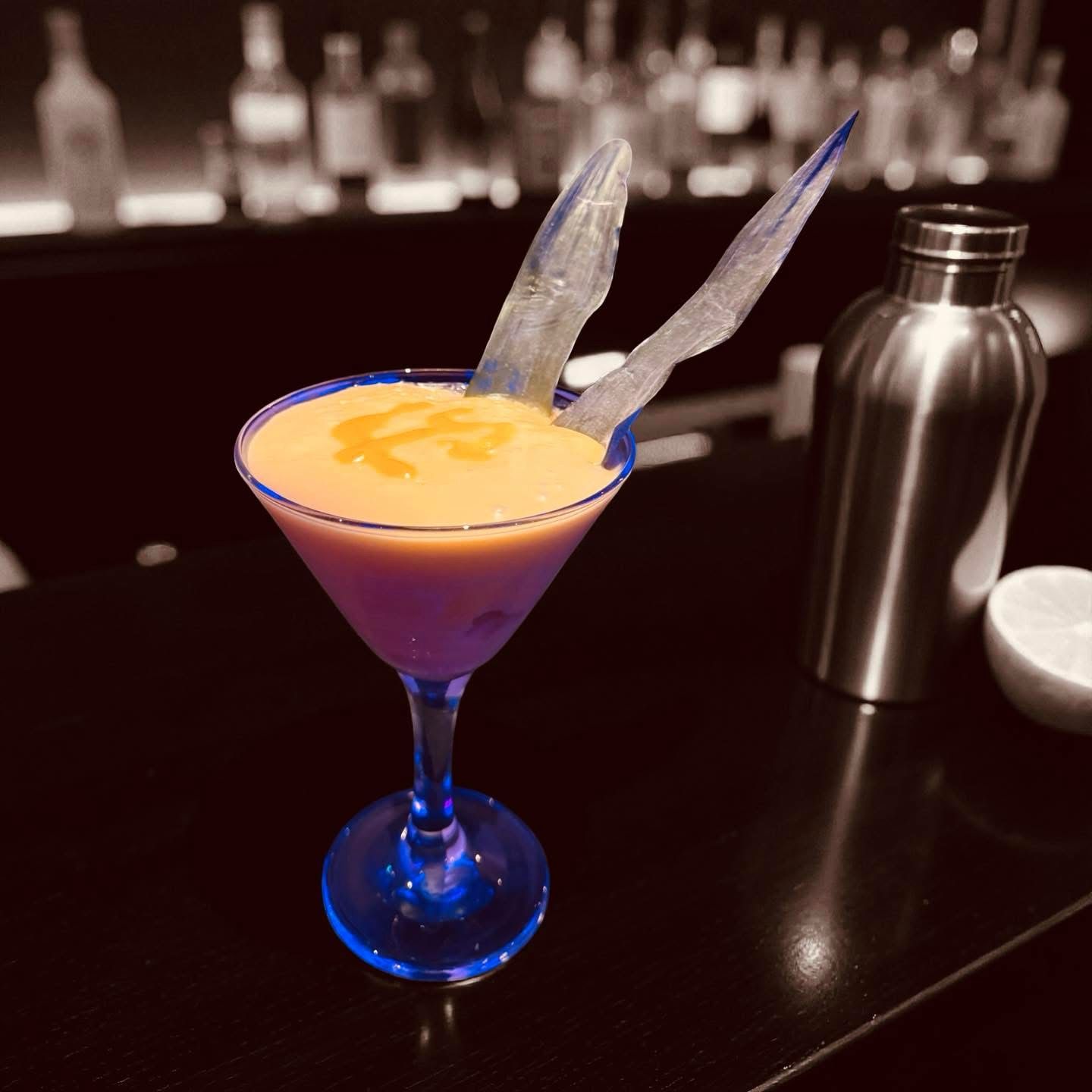 Mango cocktail in a martini glass